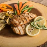 Illustrative food photograph for Lemon chicken and potato tray bake