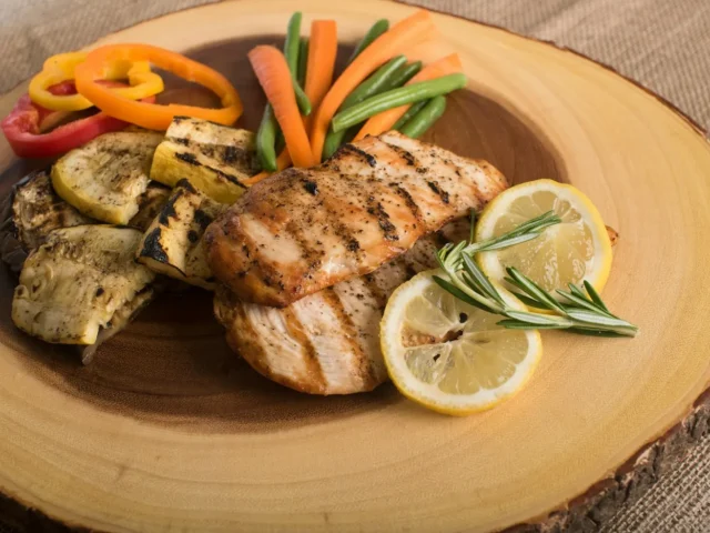 Illustrative food photograph for Lemon chicken and potato tray bake